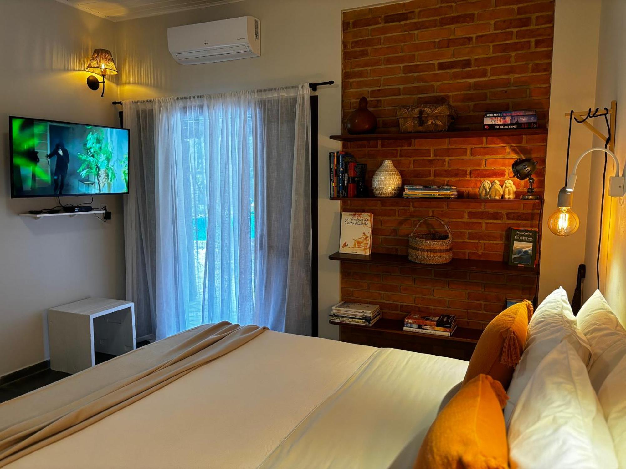 Pousada Jardim Boemio Cananéia Habitación foto